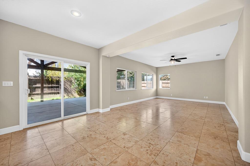 1619 7th Street Hughson, CA 95326 - Photo 18 of 61 a view of an empty room with a window