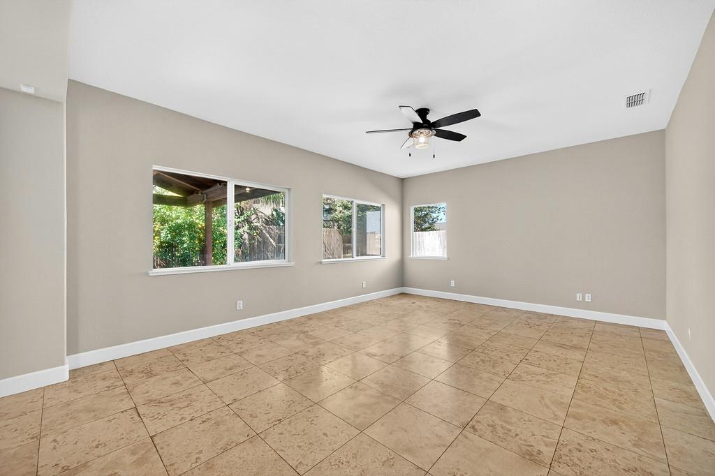 1619 7th Street Hughson, CA 95326 - Photo 20 of 61 a view of an empty room with a window