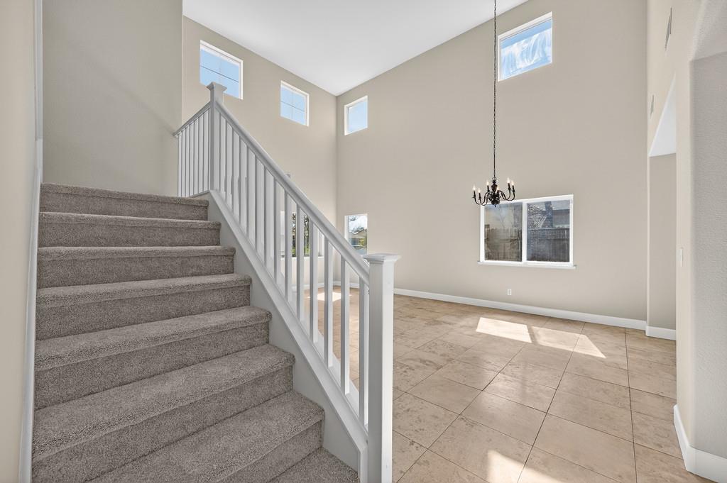 1619 7th Street Hughson, CA 95326 - Photo 24 of 61 a view of an entryway with staircase