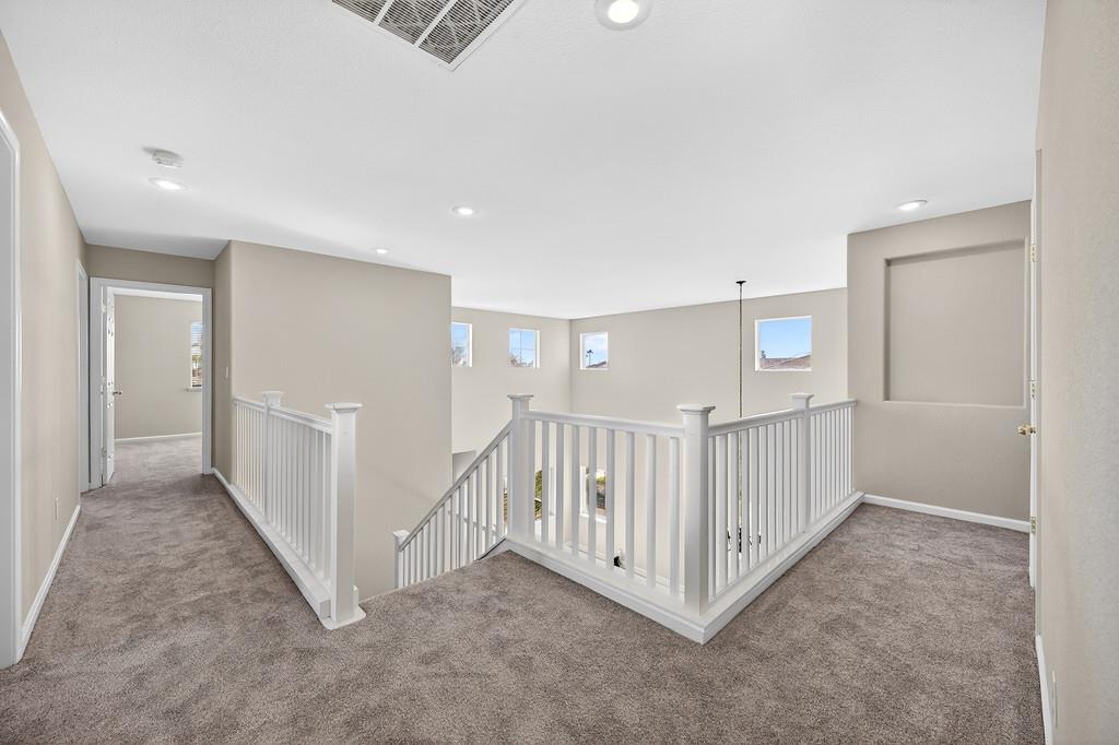 1619 7th Street Hughson, CA 95326 - Photo 25 of 61 a view of a hallway with white doors