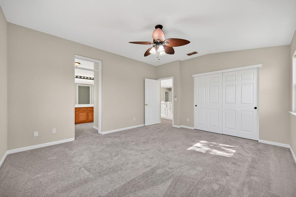 1619 7th Street Hughson, CA 95326 - Photo 27 of 61 a view of an empty room with a window