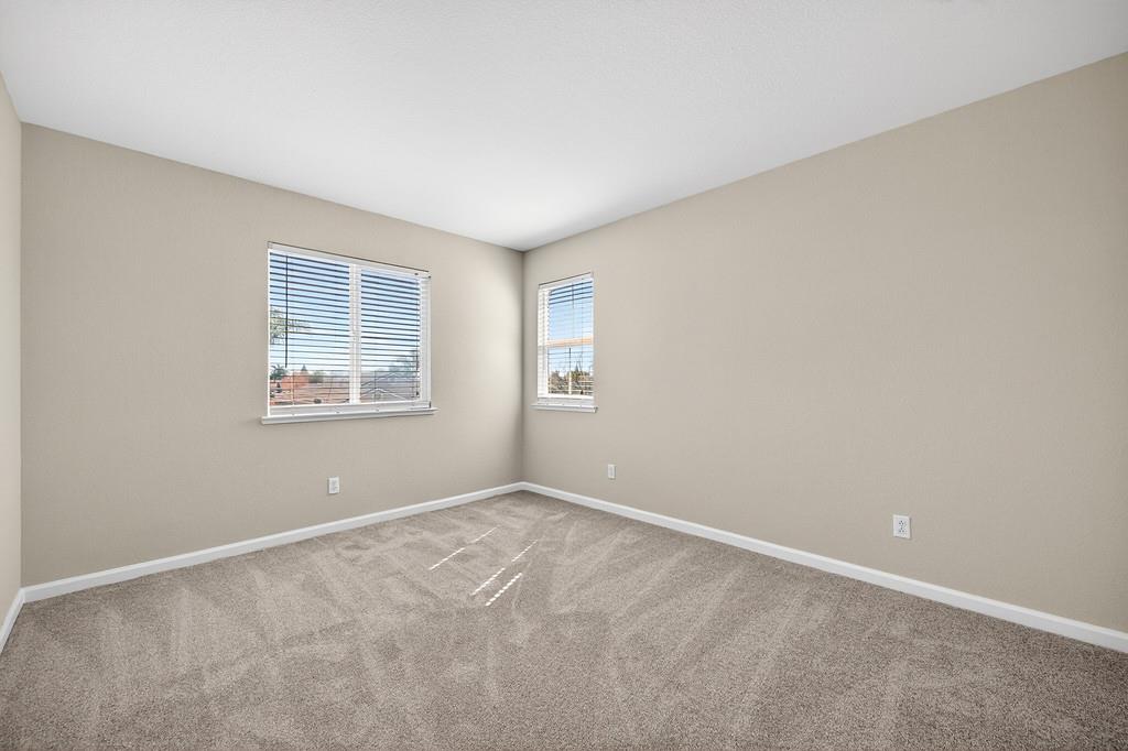 1619 7th Street Hughson, CA 95326 - Photo 33 of 61 an empty room with windows