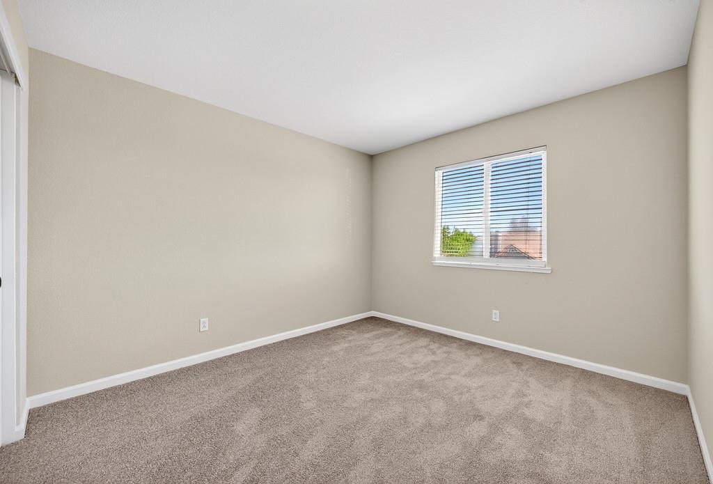 1619 7th Street Hughson, CA 95326 - Photo 36 of 61 an empty room with windows