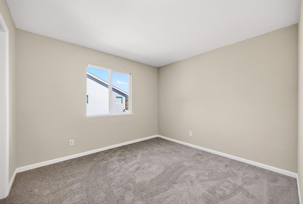 1619 7th Street Hughson, CA 95326 - Photo 39 of 61 an empty room with a window