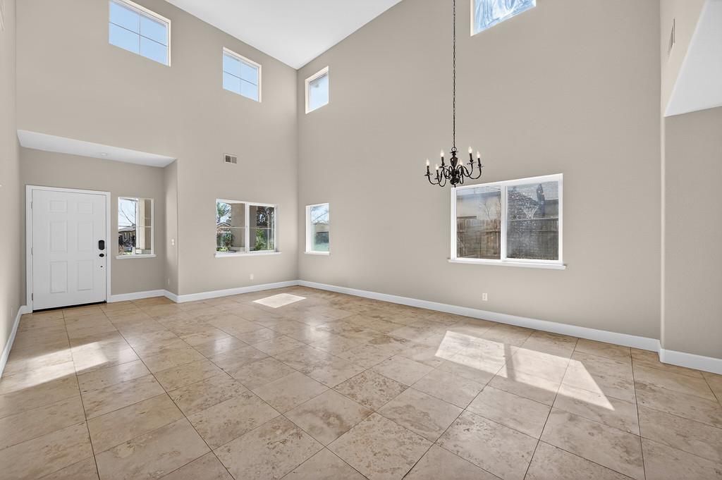 1619 7th Street Hughson, CA 95326 - Photo 5 of 61 a view of an empty room with window