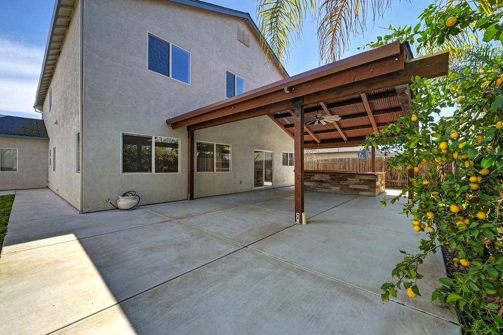 1619 7th Street Hughson, CA 95326 - Photo 61 of 61 a view of house with backyard and sitting area
