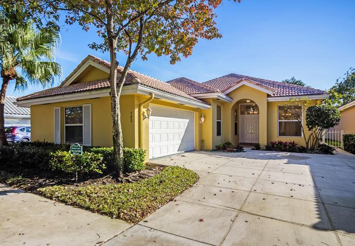 142 Hampton Circle Jupiter, FL 33458 - Photo 1 of 24 front 142 Hampton Cr