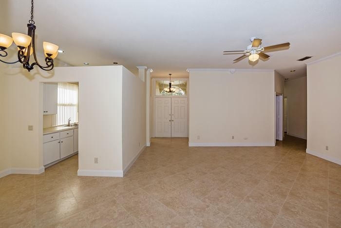 142 Hampton Circle Jupiter, FL 33458 - Photo 9 of 24 Living Rm and front entrance