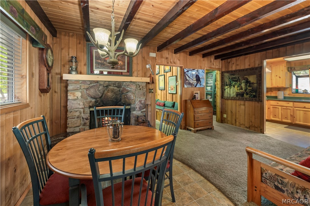 39625 Flicker Road Fawnskin, CA 92333 - Photo 4 of 47 An extra dining area or a place to put a puzzle together. Beautiful rock fireplace.
