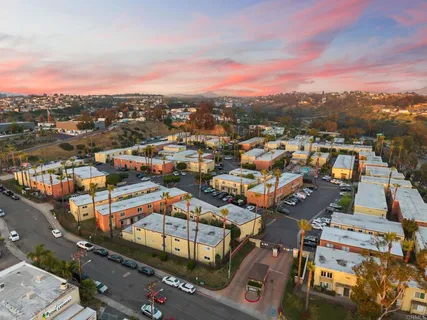 an aerial view of a city with lots of residential buildings