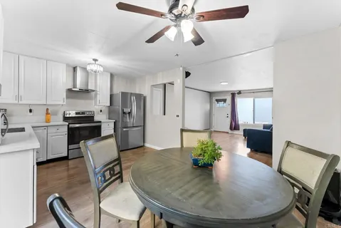 a view of a dining room with furniture