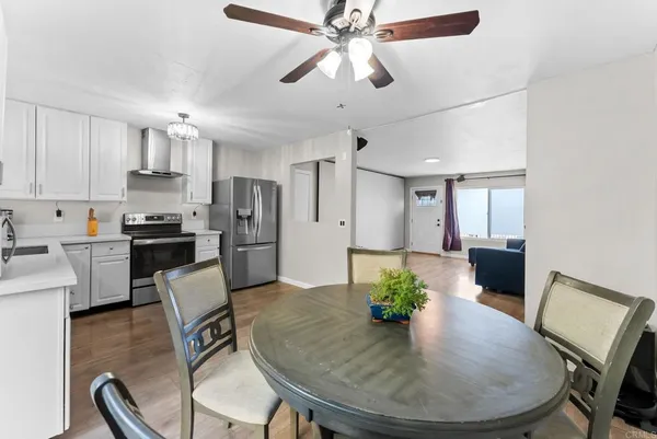 a view of a dining room with furniture