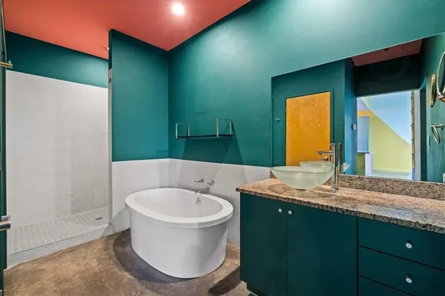 a view of balcony with wooden floor and fence