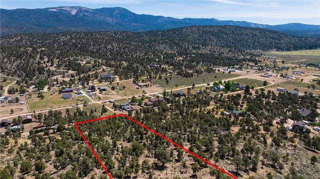 a view of a city with a mountain