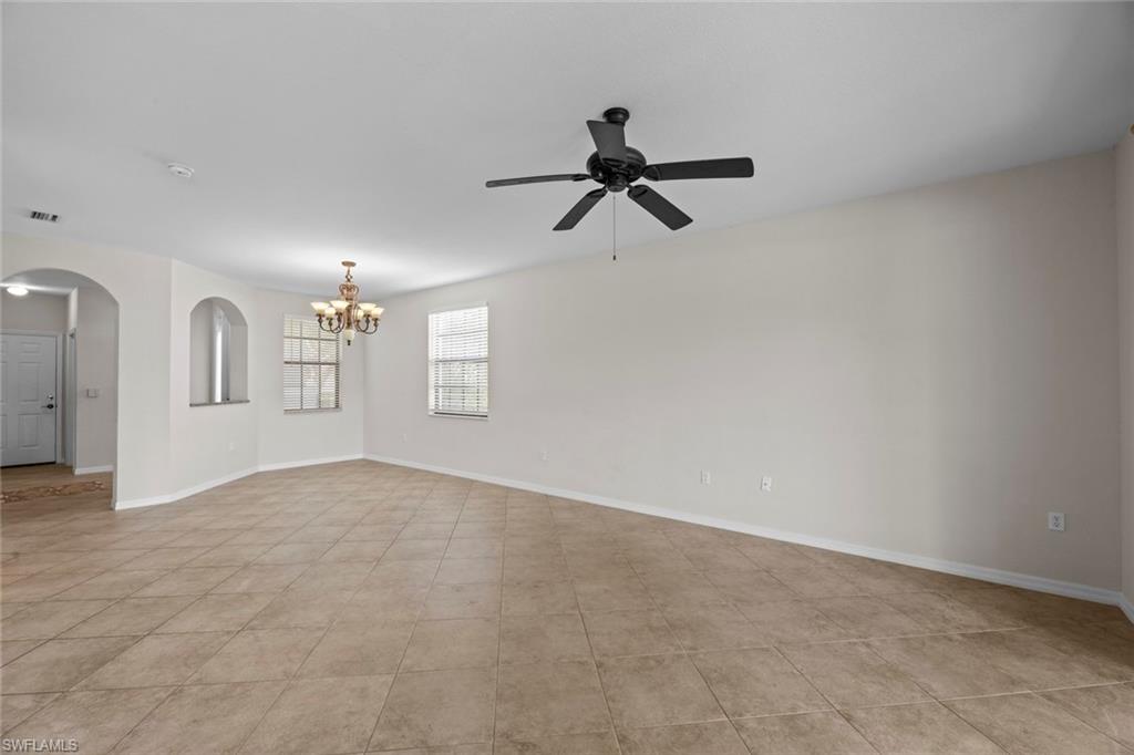 15594 Summit Pl Circle, Unit 402 Naples, FL 34119 - Photo 35 of 45 wooden floor in an empty room