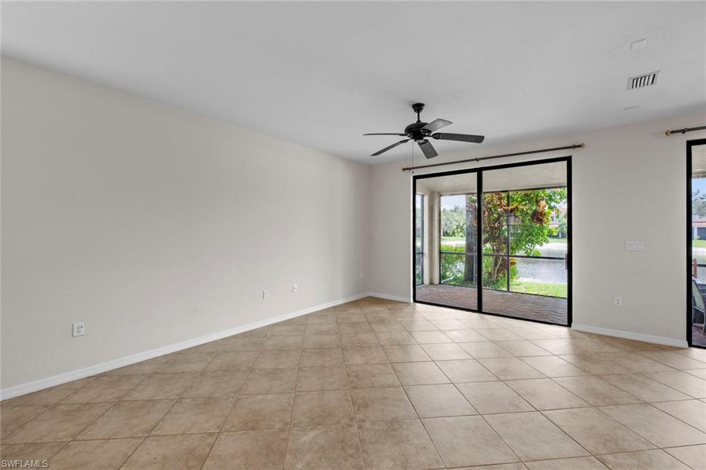15594 Summit Pl Circle, Unit 402 Naples, FL 34119 - Photo 36 of 45 a view of an empty room with a window