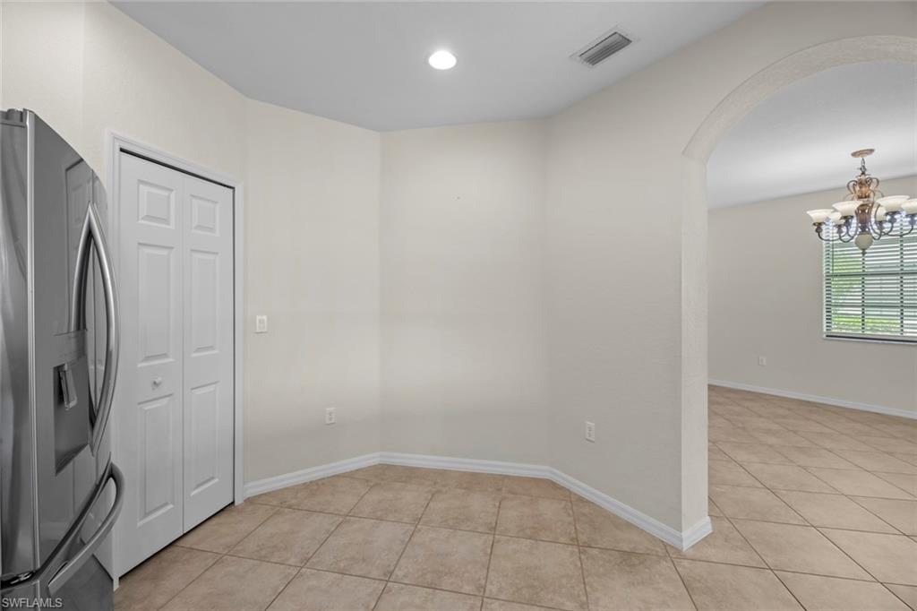 15594 Summit Pl Circle, Unit 402 Naples, FL 34119 - Photo 10 of 45 a view of an empty room