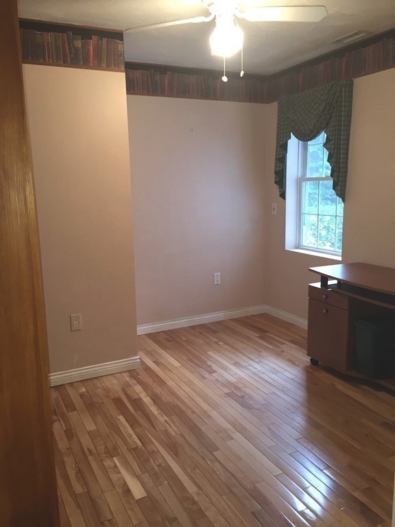 37 Kruse Road Hubbardston, MA 01452 - Photo 11 of 29 a view of an empty room with wooden floor and a window