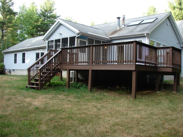 37 Kruse Road Hubbardston, MA 01452 - Photo 29 of 29 a view of a house with a yard and deck