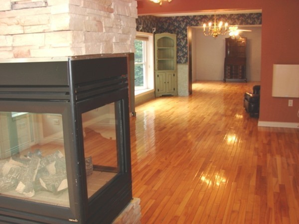 37 Kruse Road Hubbardston, MA 01452 - Photo 8 of 29 a view of a room with wooden floor and a ceiling fan