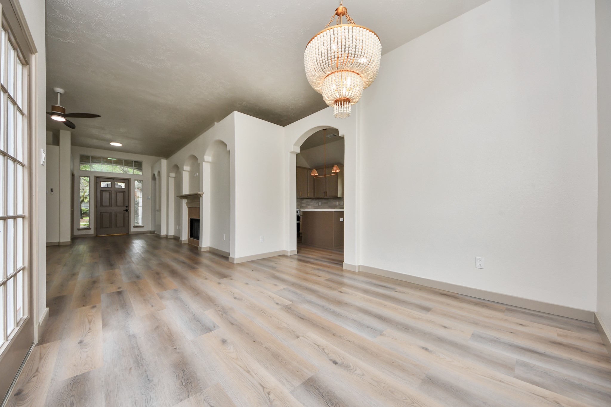 14423 Gadwall Court Houston, TX 77044 - Photo 21 of 42 a view of a hallway with wooden floor