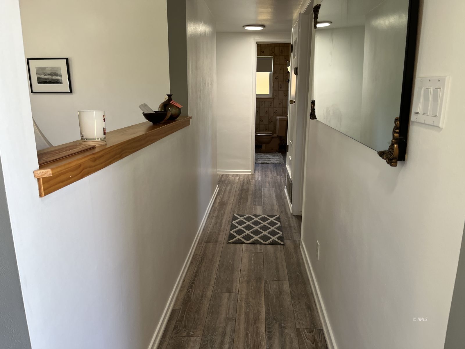 3012 Mesquite Road Bishop, CA 93514 - Photo 22 of 26 a view of hallway with wooden floor