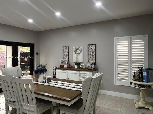16131 Southwest 79th Terrace Miami, FL 33193 - Photo 14 of 32 a dining room with furniture and window
