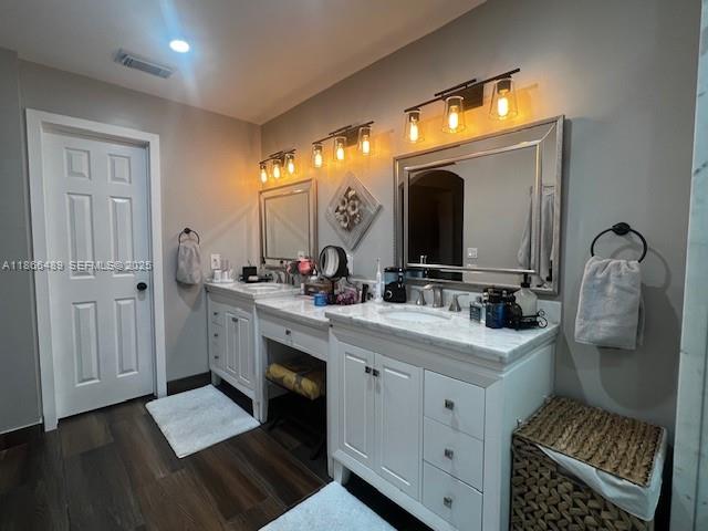 16131 Southwest 79th Terrace Miami, FL 33193 - Photo 24 of 32 a bathroom with a sink and a mirror