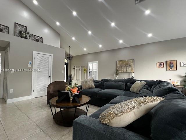 16131 Southwest 79th Terrace Miami, FL 33193 - Photo 6 of 32 a living room with furniture and a couch