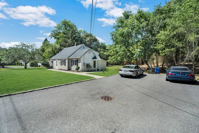 a view of street with parked cars