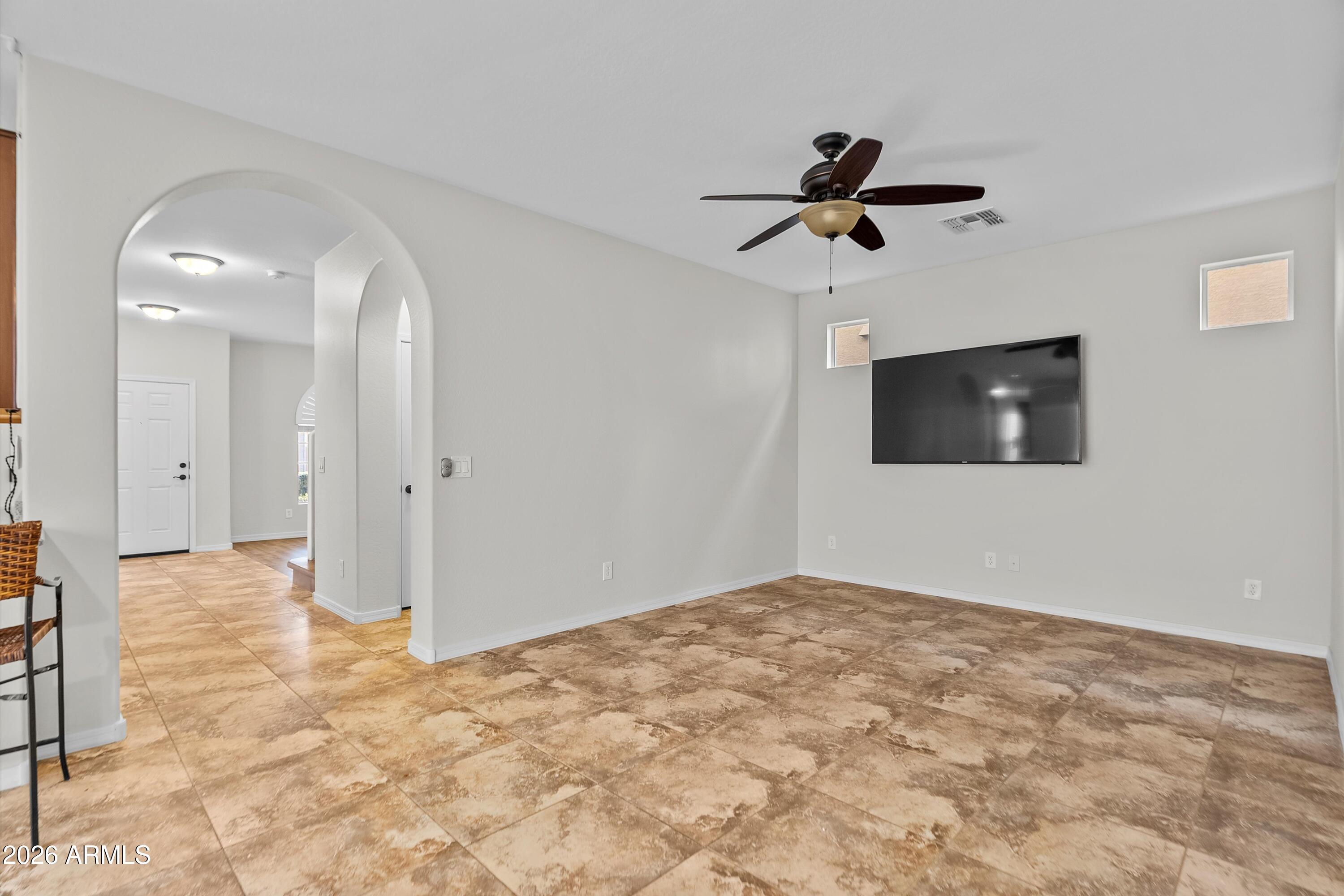 955 South Henry Lane Gilbert, AZ 85296 - Photo 14 of 40 a view of empty room with ceiling fan