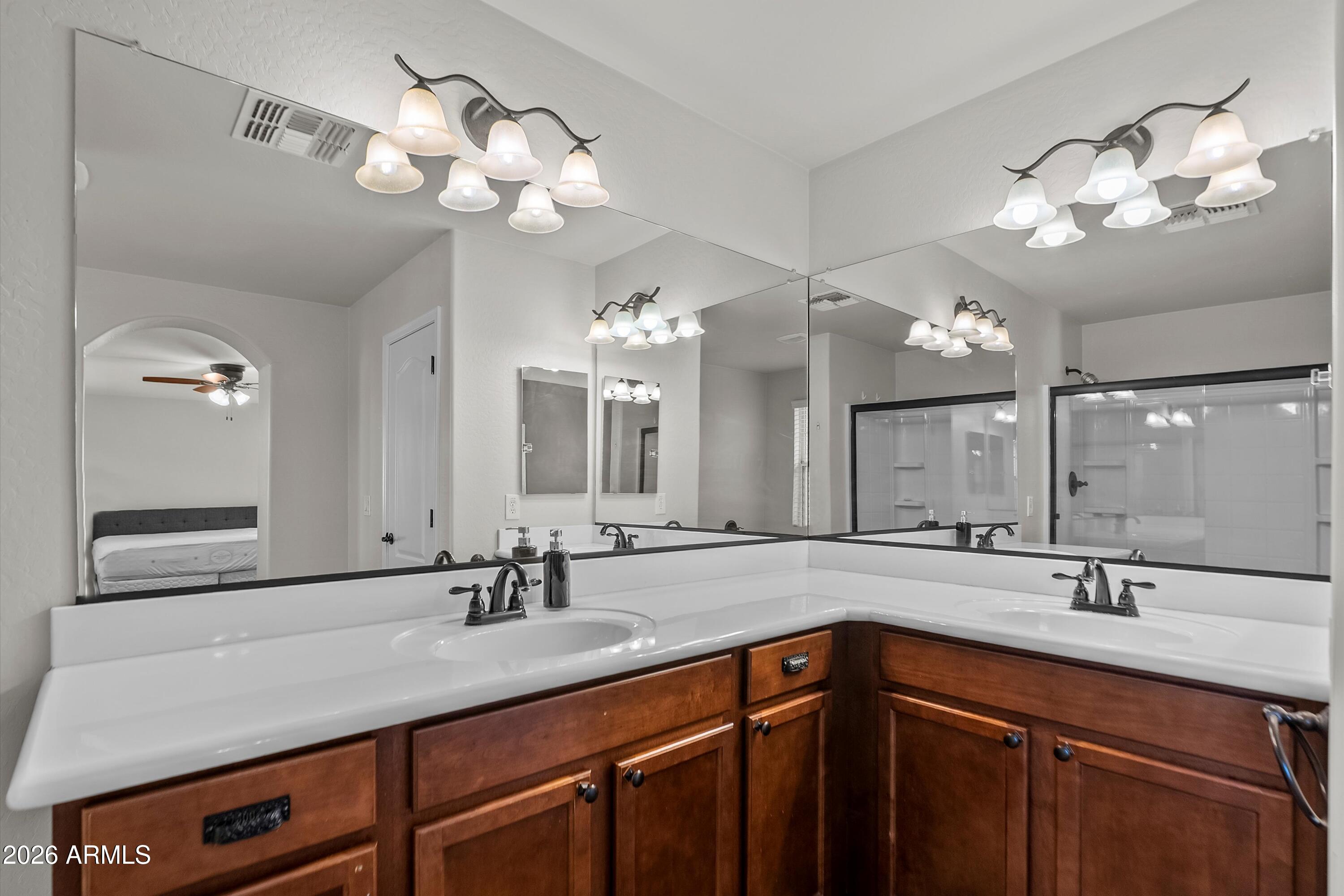 955 South Henry Lane Gilbert, AZ 85296 - Photo 24 of 40 a bathroom with a sink vanity and a mirror