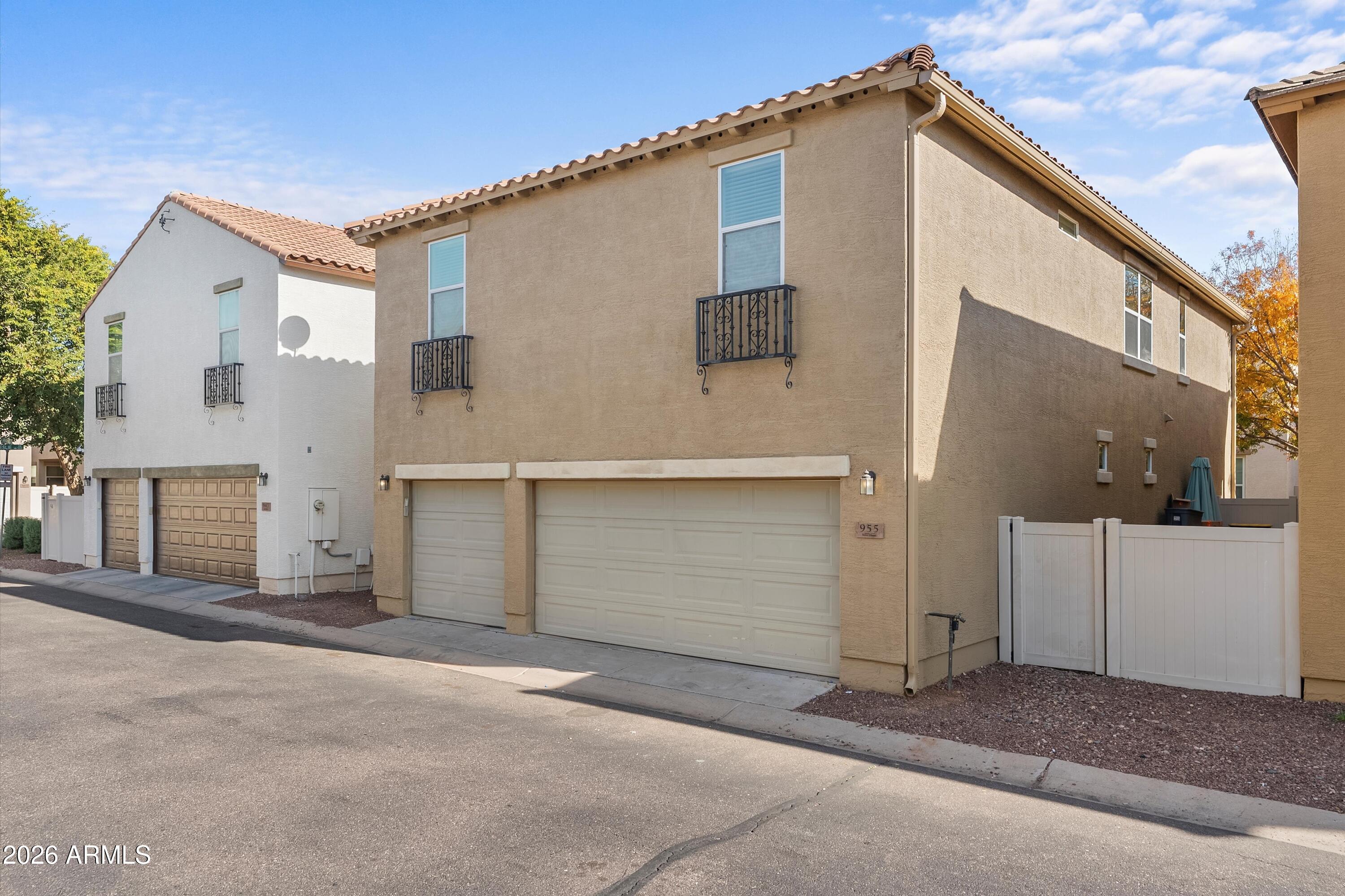 955 South Henry Lane Gilbert, AZ 85296 - Photo 35 of 40 a view of a house with a garage