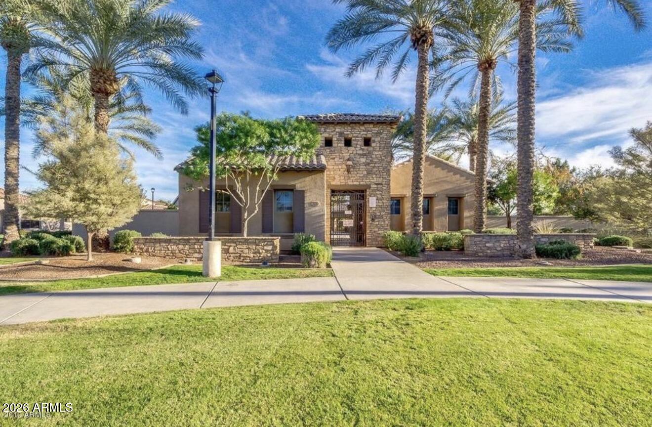 955 South Henry Lane Gilbert, AZ 85296 - Photo 36 of 40 a view of a house with a swimming pool