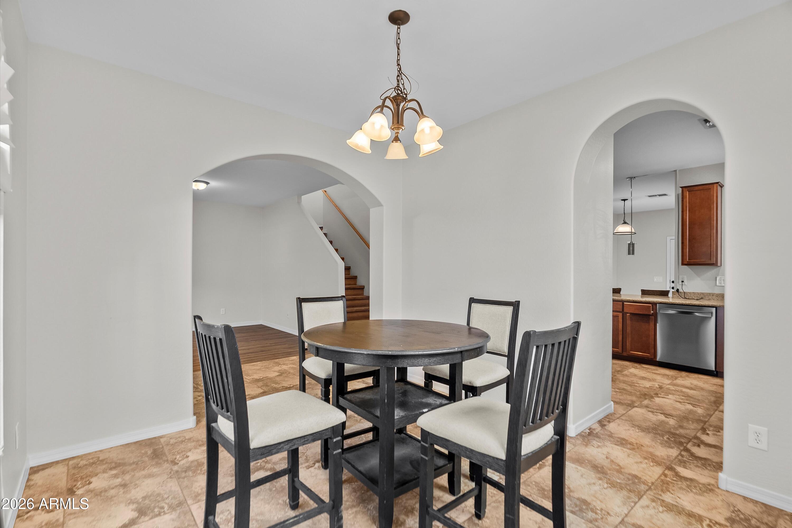 955 South Henry Lane Gilbert, AZ 85296 - Photo 6 of 40 a dining room with furniture and window