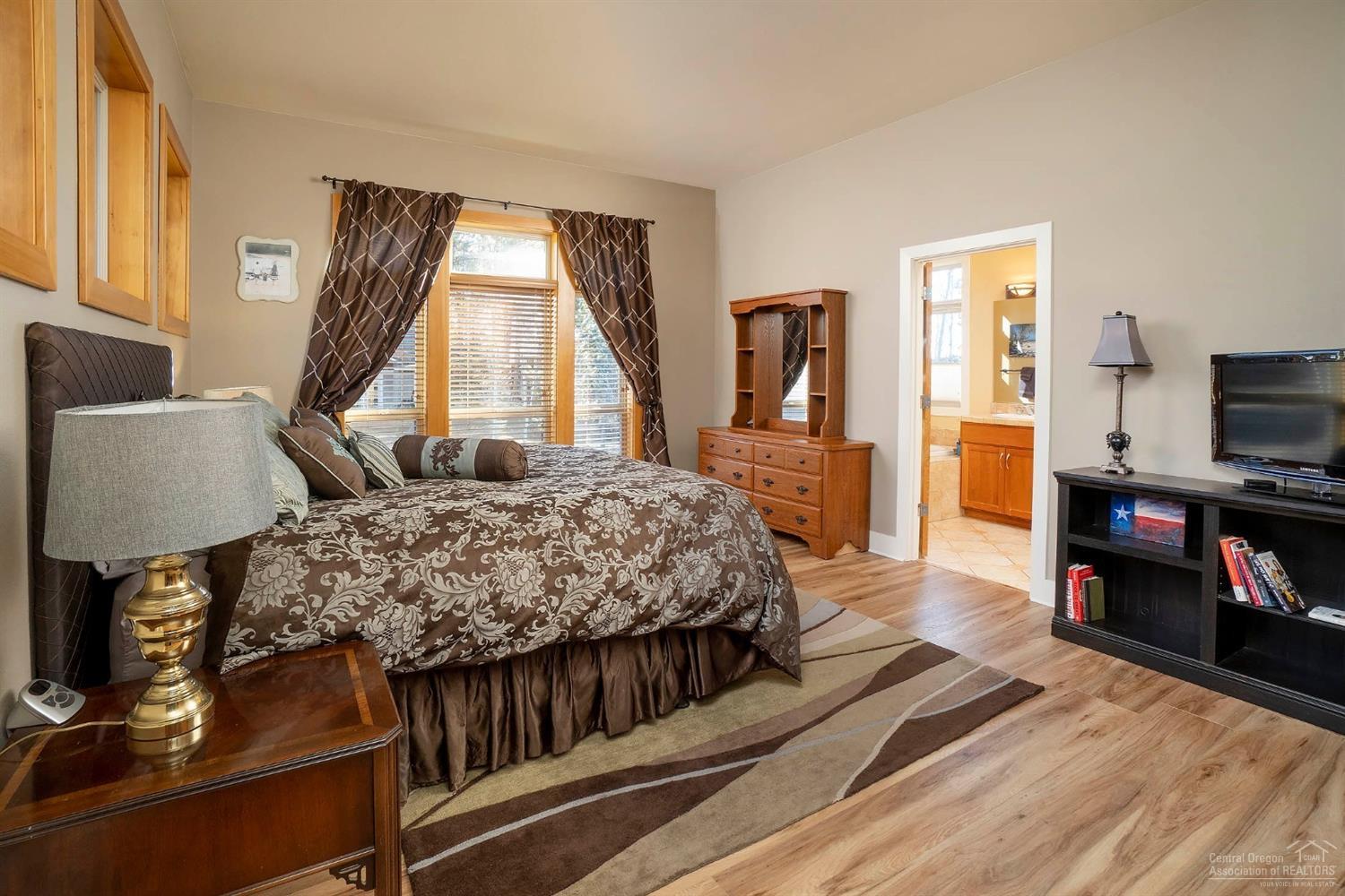 61842 Fall Creek Loop Bend, OR 97702 - Photo 10 of 22 Beautiful main level master suite with v