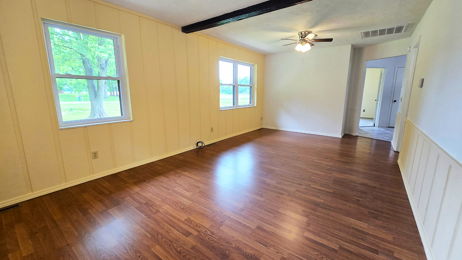787 Walnut Hill Road Centralia, IL 62801 - Photo 20 of 42 a view of an empty room with wooden floor and a window
