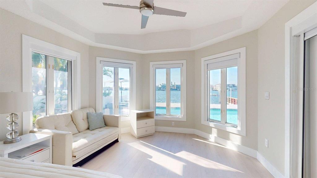 509 55th Avenue St. Pete Beach, FL 33706 - Photo 34 of 63 a living room with furniture and a large window