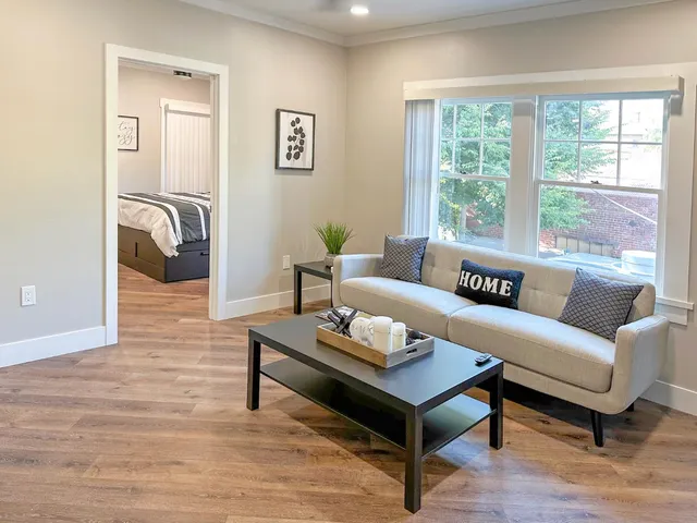a patio with table and chairs