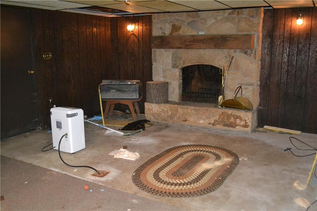 131 Weckerly Road Butler, PA 16002 - Photo 16 of 25 a room with a fireplace and a fireplace