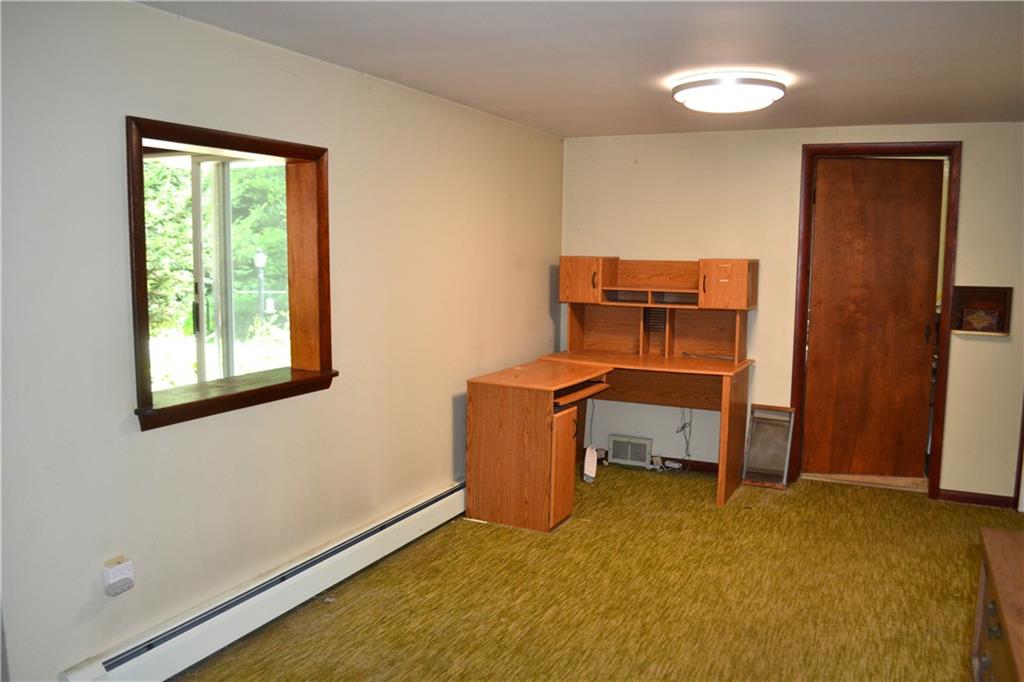 131 Weckerly Road Butler, PA 16002 - Photo 7 of 25 a room that has a bed and a desk in it