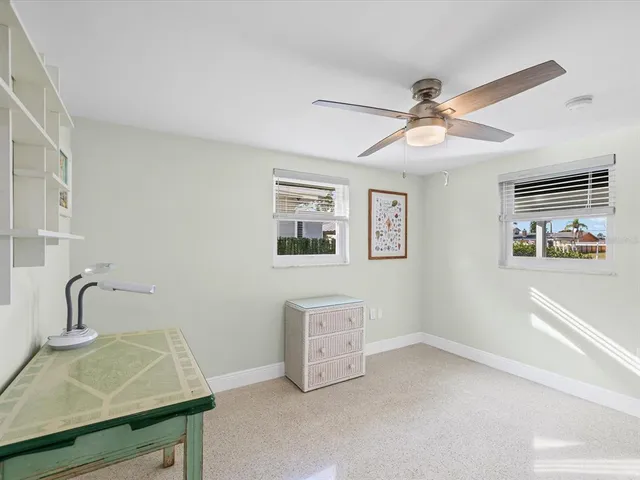 a bathroom with a toilet a sink and shower