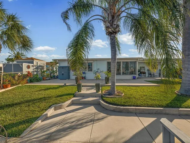 an outdoor space with lots of fruit and vegetables