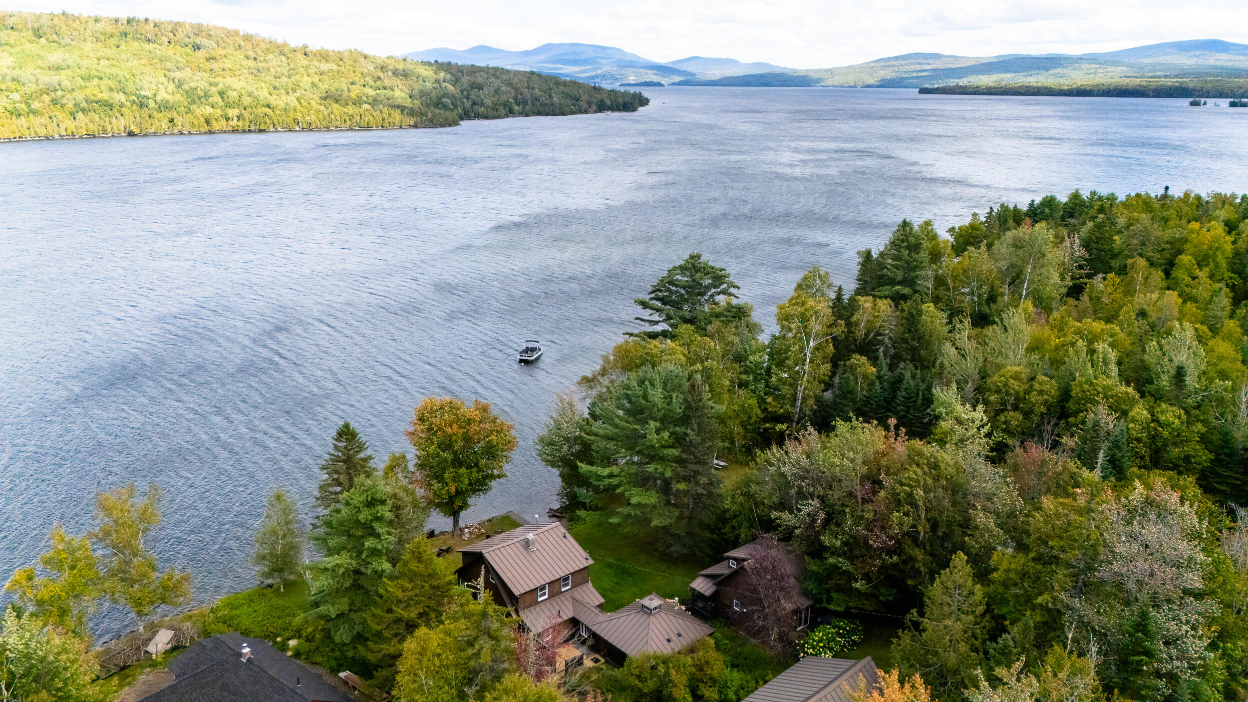188 Rumford Road Rangeley, ME 04964 - Photo 9 of 64 DJI_20260910143749_0188_D