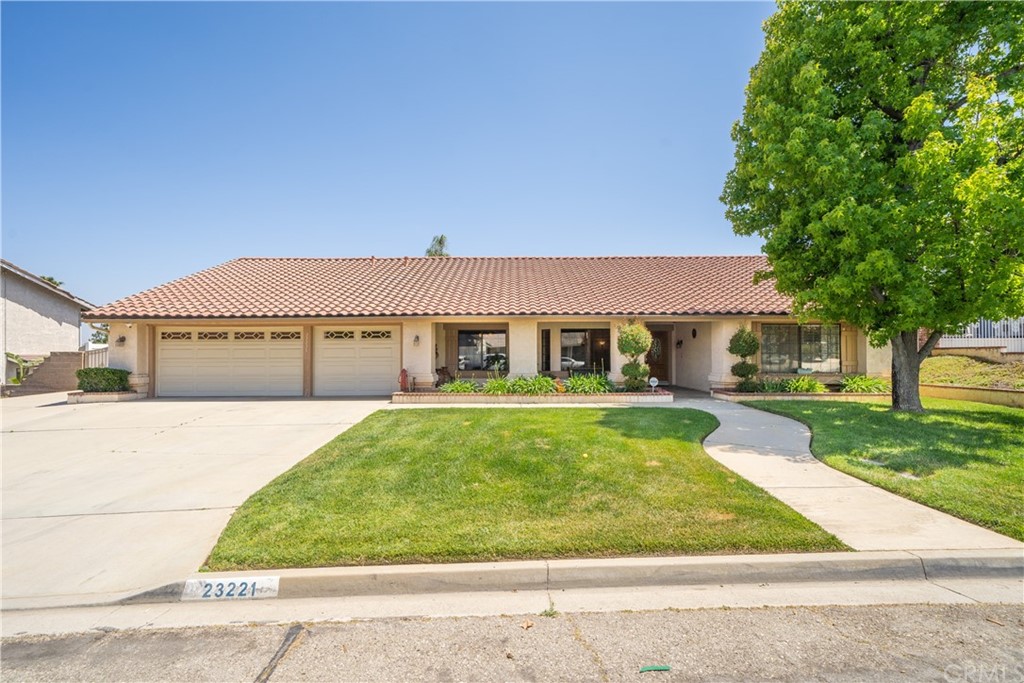 23221 Ranger Street Moreno Valley, CA 92557 - Photo 1 of 1 a front view of house with yard