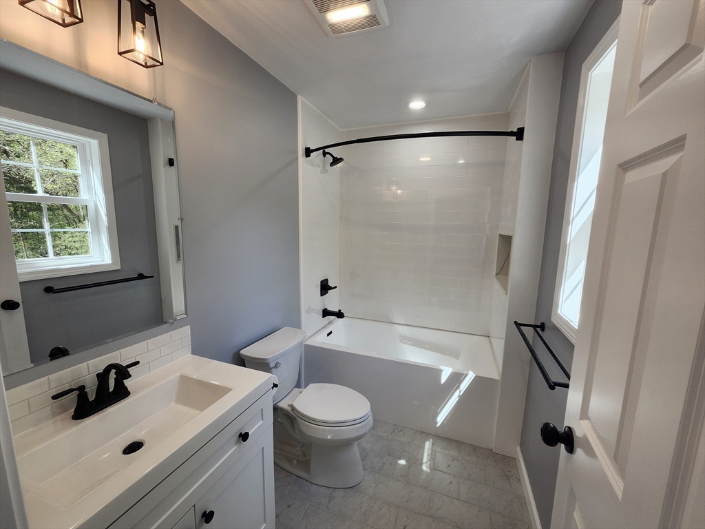 158 Lower Hampden Road Monson, MA 01057 - Photo 12 of 19 a bathroom with a sink toilet tub and shower