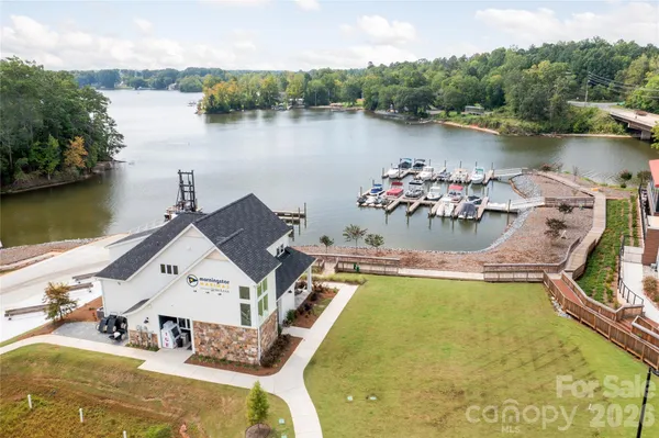 a view of a swimming pool with a lake view