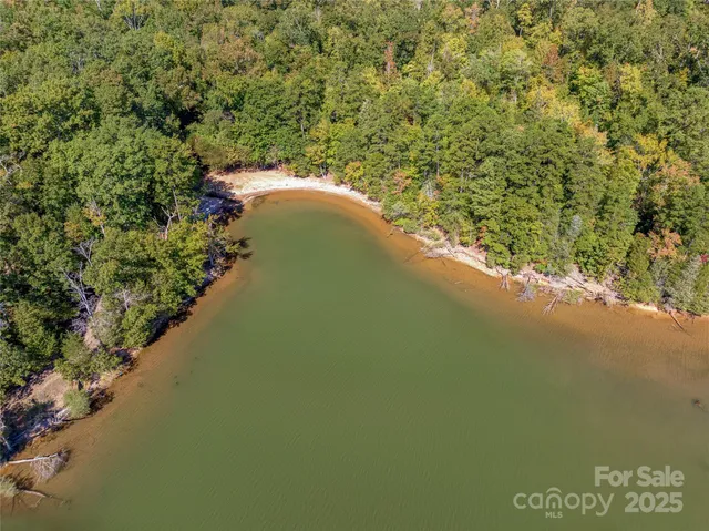 a view of a lake with a yard