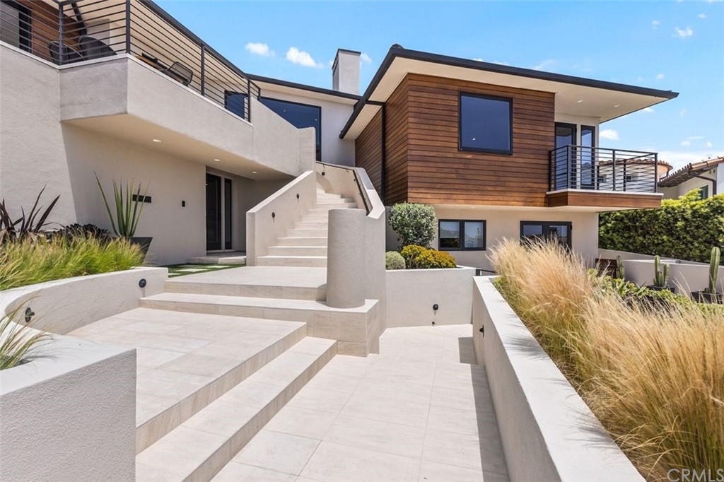 846 Emerald Bay Laguna Beach, CA 92651 - Photo 3 of 42 a front view of house with a yard
