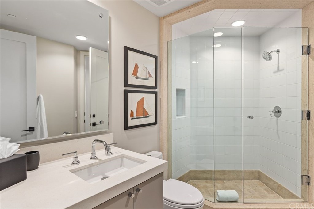 846 Emerald Bay Laguna Beach, CA 92651 - Photo 33 of 42 a bathroom with a sink toilet and shower